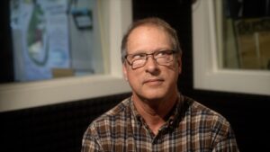This image features a close-up of Howard Allen.