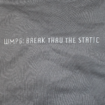 Picture of a closeup from the WMPG crewneck with embroidered letters saying "WMPG: Break Thru The Static".