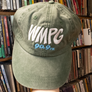 Picture of a hand holding up the WMPG green baseball hat