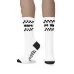 Picture of a digital representation of the WMPG black and white checkered socks. One of the feet in this image is sideways showing off the details on the socks.